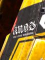 An extreme close up on "KNOS", bellow, the player can *barely* make out "we love warden"